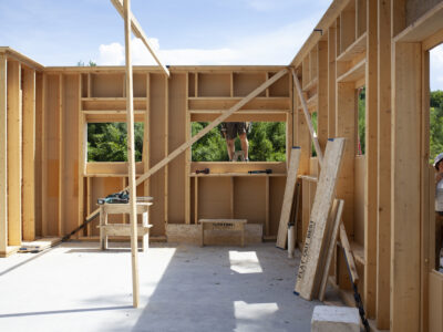 continuous wood fiber insulation installed on wood frame walls of a new house